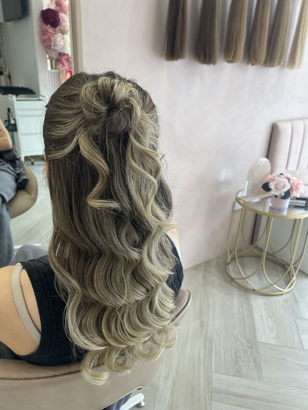 Textured blonde half up with sculpted waves